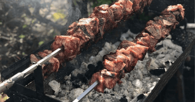 Lamb Souvla Cooked over Charcoal on a Cyprus BBQ